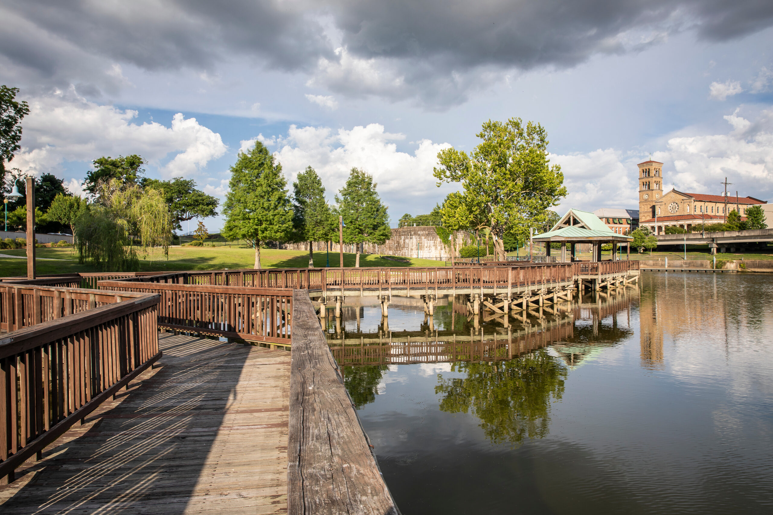 The Bayou Plaquemine Waterfront Park in the heart of downtown Plaquemine features an open air pavilion, a three-tiered terrace, a walkway connecting the Plaquemine Lock Site, fishing pier and a boat docking area.